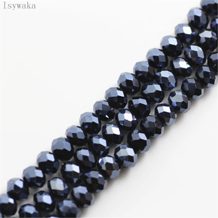 A close-up of a strand of dark blue and purple faceted crystal glass beads used for jewelry making.