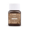 Brown textile fabric dye kit in a glass jar with a white cap