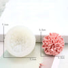 A pink ruffled flower silicone mold is shown next to its measurement guide.