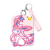 A pink display card set featuring Greninja and Sylveon Pokémon characters on a keychain.