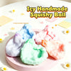 A collection of handmade squishy balls in various pastel colors, including blue, pink, and green, displayed on a light surfac