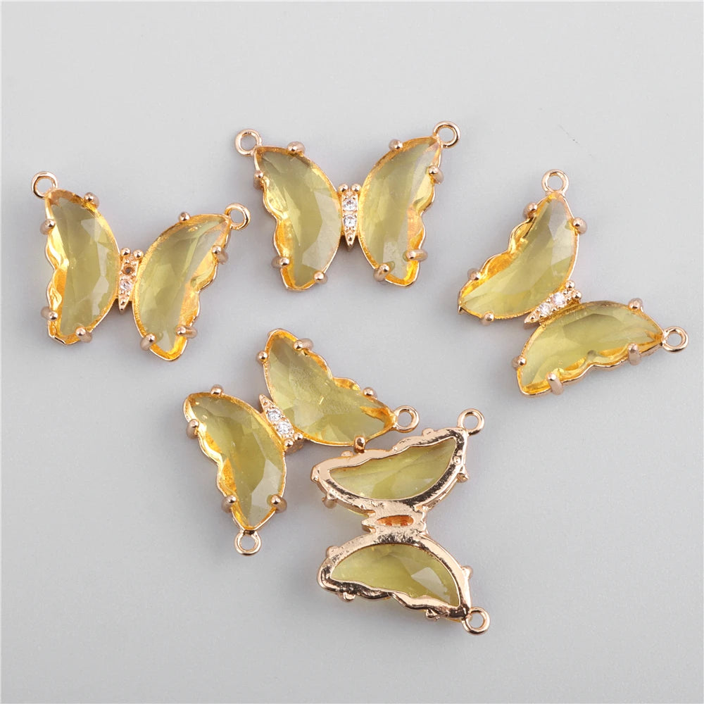 Gold-toned crystal butterfly charm beads used for jewelry making