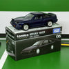 A dark blue Tomica Nissan 180SX die-cast sports car model displayed on its packaging.