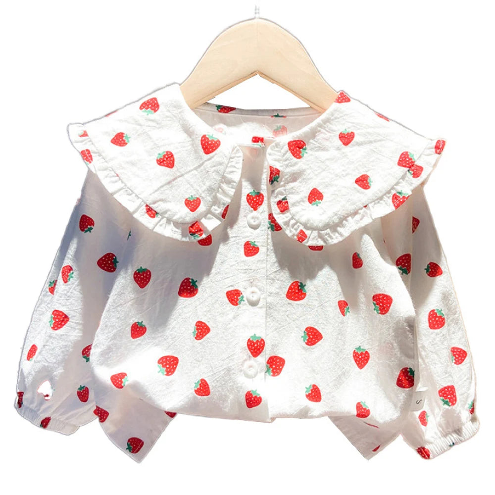 White long-sleeve shirt for a baby girl with a strawberry print and Peter Pan collar