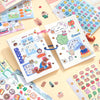 A collection of kawaii cartoon stickers and writable notes for DIY scrapbooking laid out on a light background.