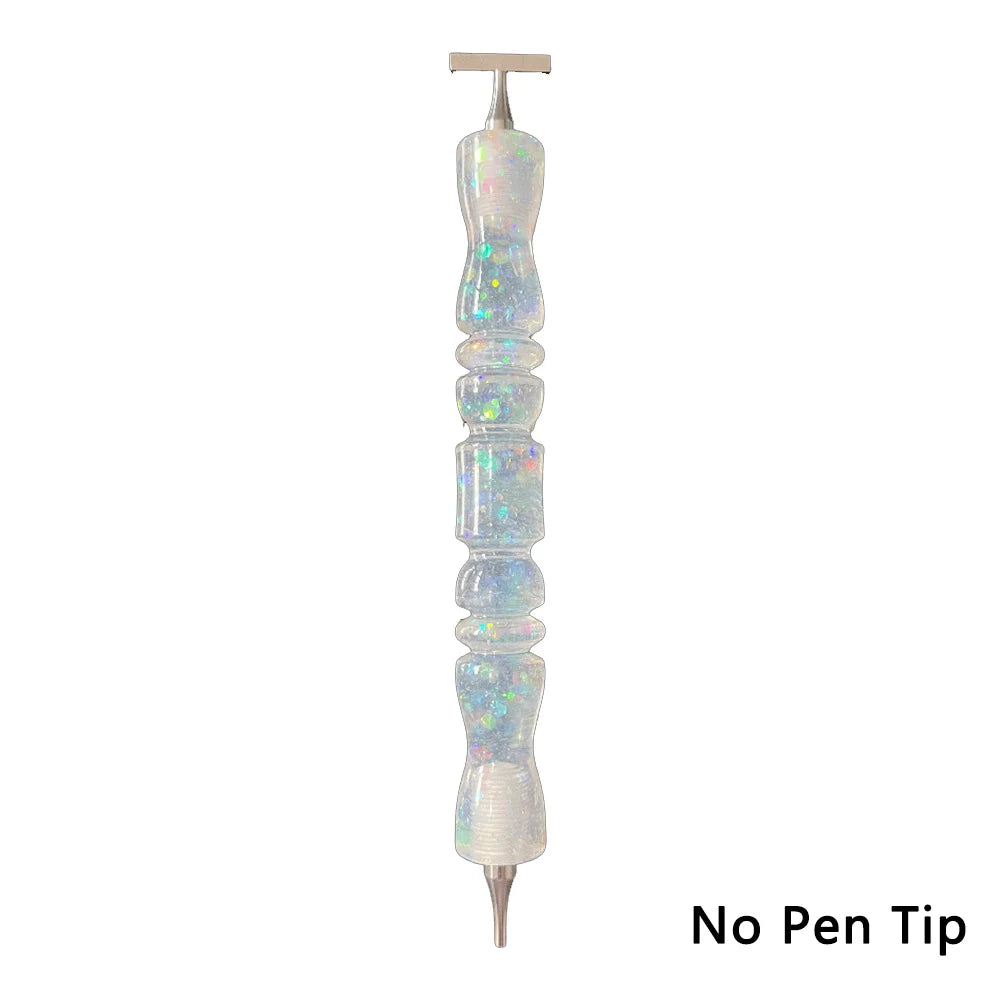 A clear, elongated diamond painting pen with an interchangeable resin tip, shown vertically.
