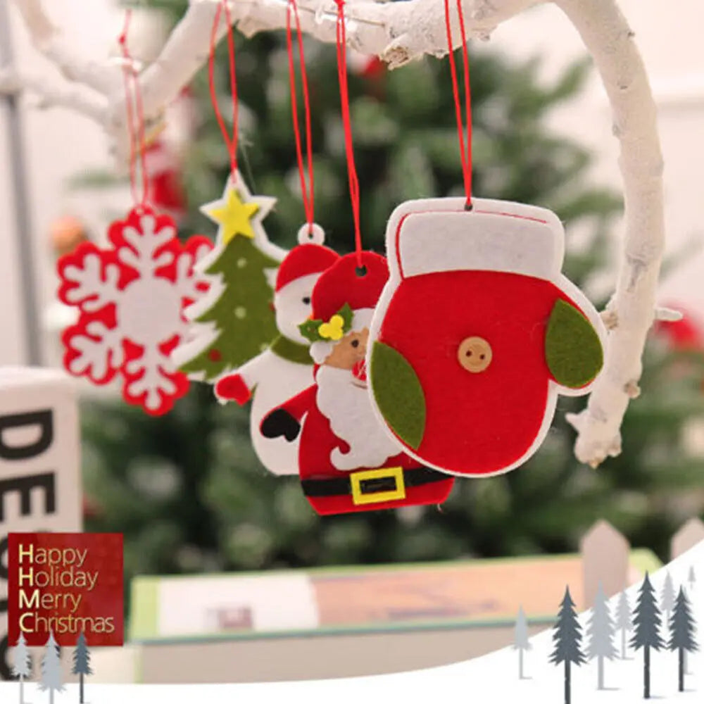 A red felt ornament shaped like a Christmas tree with a yellow star hanging from a white branch.
