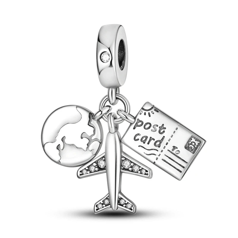 Sterling silver charm beads featuring a globe and a postcard design for DIY bracelet making