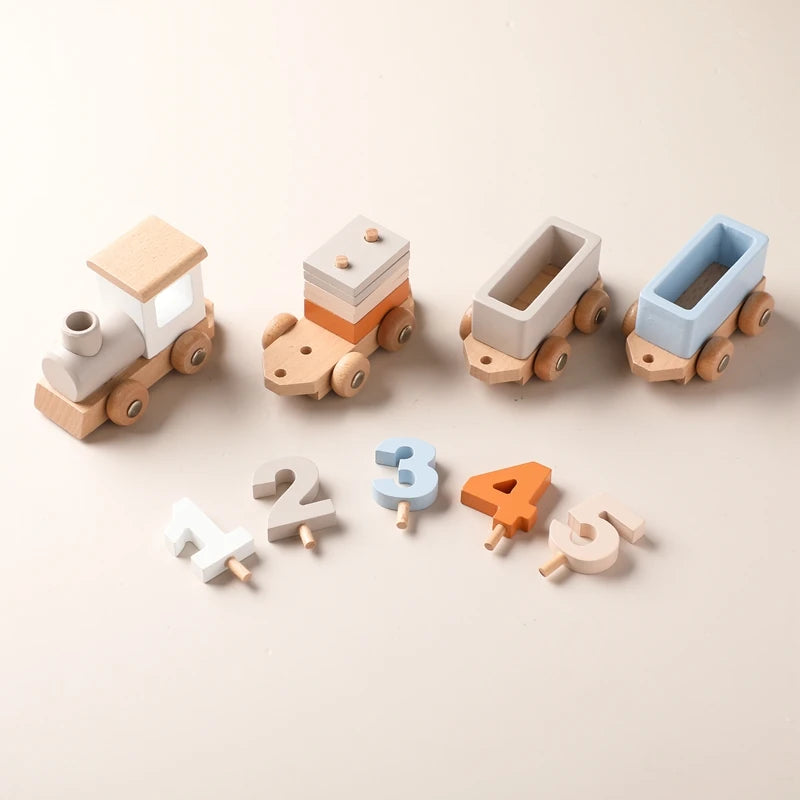 A set of wooden train cars painted in various colors and numbered blocks 1 through 4 for a Montessori educational toy.