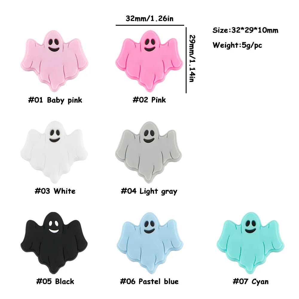 A set of seven silicone ghost beads in various colors including pink, white, gray, black, blue, and cyan.