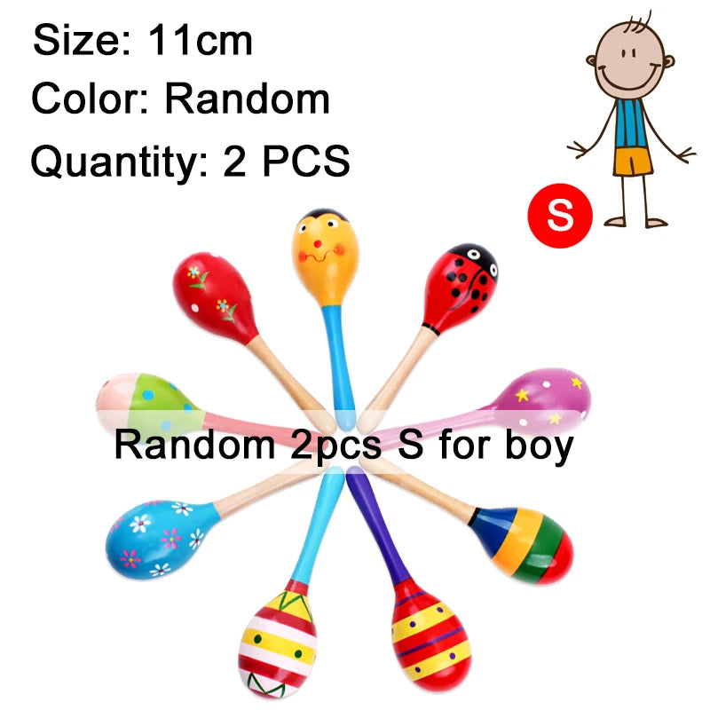 Two wooden sand hammers for boys, one yellow and one pink, are shown against a white background.