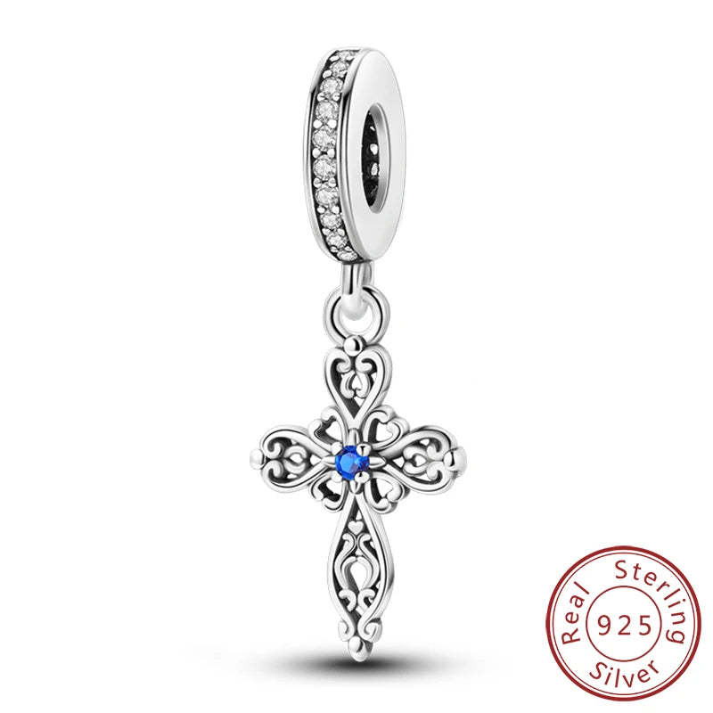 Sterling silver charm beads set featuring cross, angel, and evil eye designs for DIY jewelry making