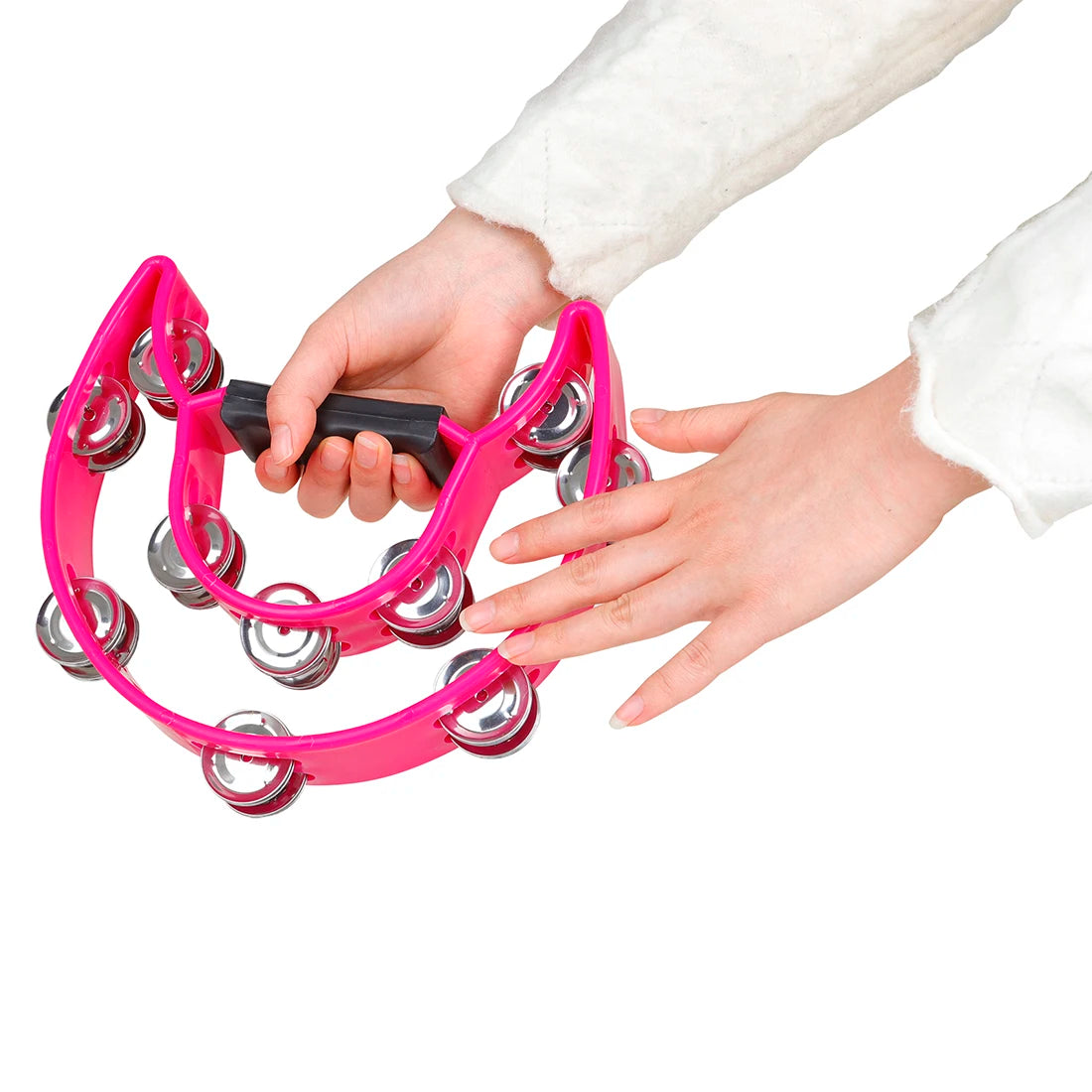 A hand is holding a bright pink double-layer tambourine with metal bells for kids.