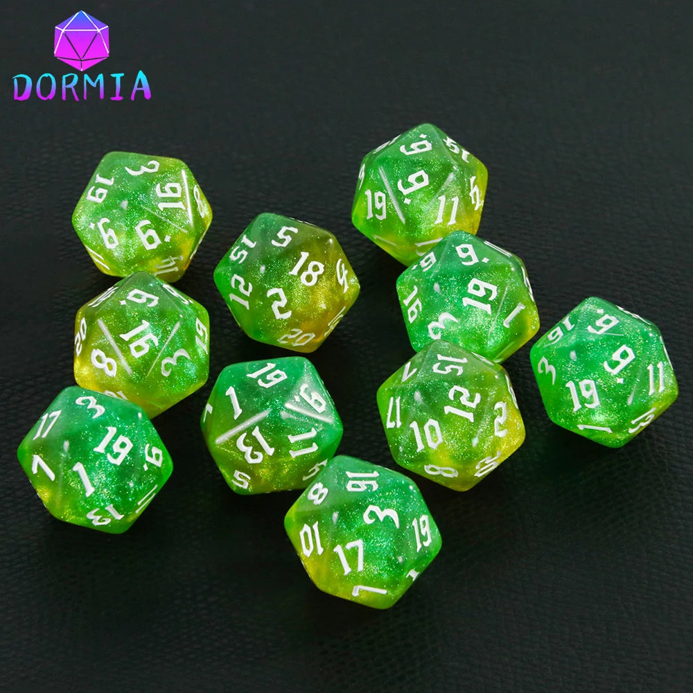 A collection of ten glittery green polyhedral dice in various colors scattered on a dark surface.