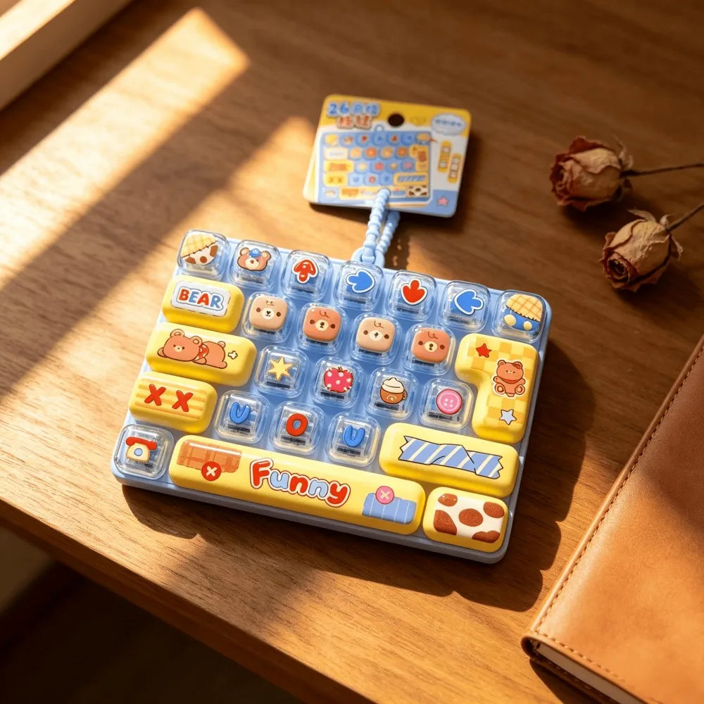 A colorful keyboard keycap clicker fidget toy with various characters and shapes resting on a wooden surface.