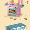 A pink mini pretend play kitchen set with cooking accessories and storage trays.