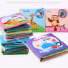A collection of soft cloth books featuring different animals like giraffe, owl, and sea creatures for baby learning.