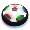 A glossy soccer ball floating above a black surface with colorful LED lights illuminating the ball and surrounding area.