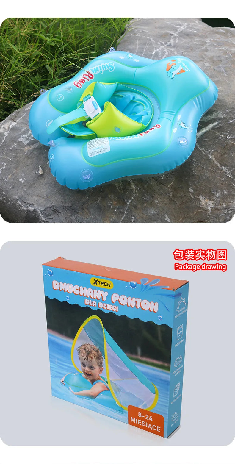 A blue inflatable baby seat ring with a yellow sunshade canopy is shown on a gray rock.