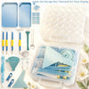 A clear storage box filled with diamond art tools including dotting pens, trays, and a funnel.