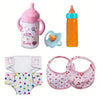 A set of baby feeding and care accessories including a pink sippy cup, an orange bottle, and pink floral baby diapers.