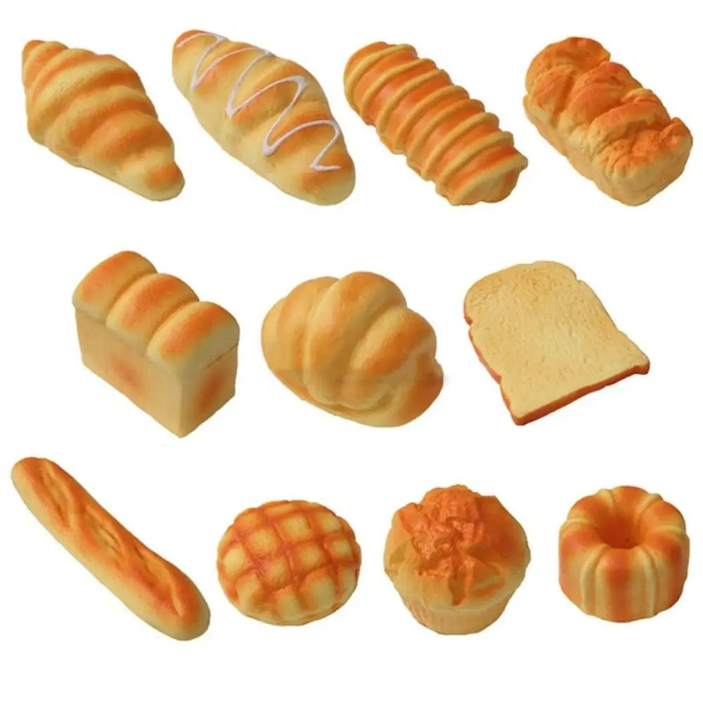 A collection of various baked bread shapes and textures, including croissants, rolls, and slices.