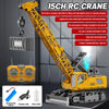 A yellow 15 inch RC crane truck with a boom and hook is shown, along with a remote control transmitter and battery.