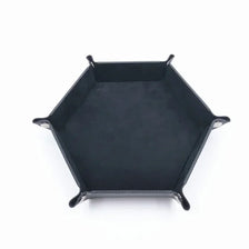 A black hexagonal folding PU leather dice tray.