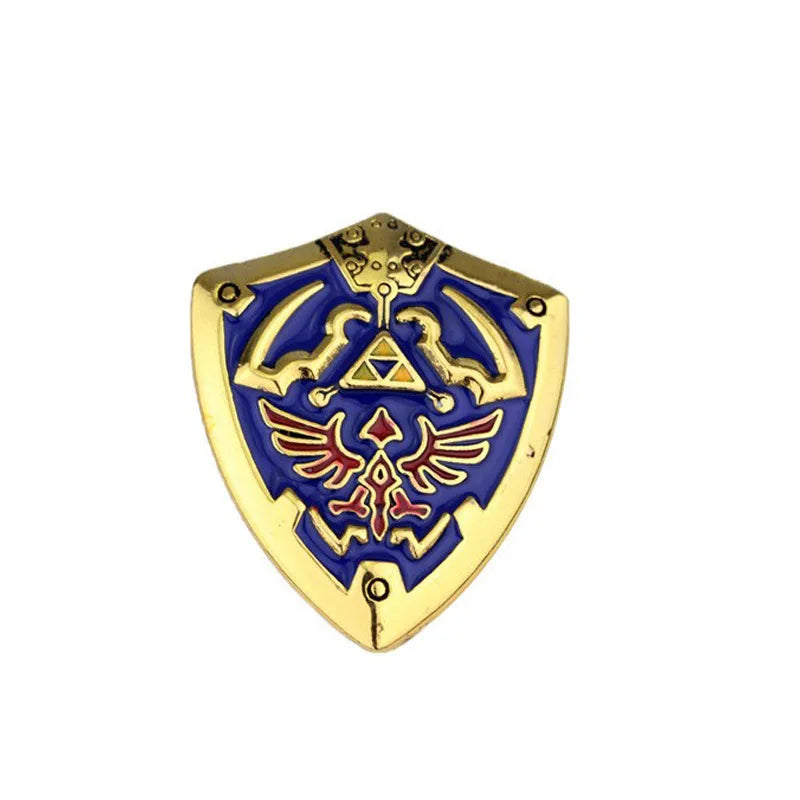 A gold and blue enamel pin brooch featuring a stylized eagle design on a shield shape.