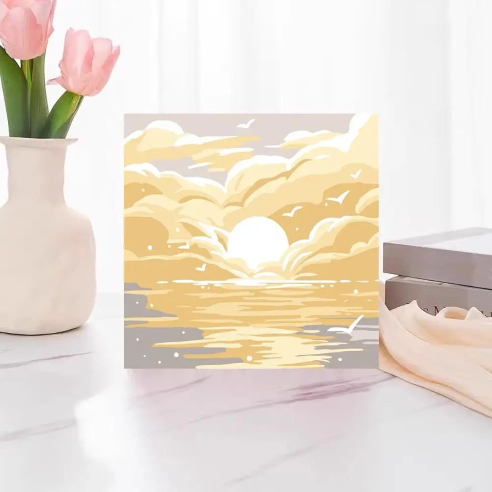 Abstract sunset landscape paint by numbers kit featuring a bright yellow and orange sky with silhouetted birds over water