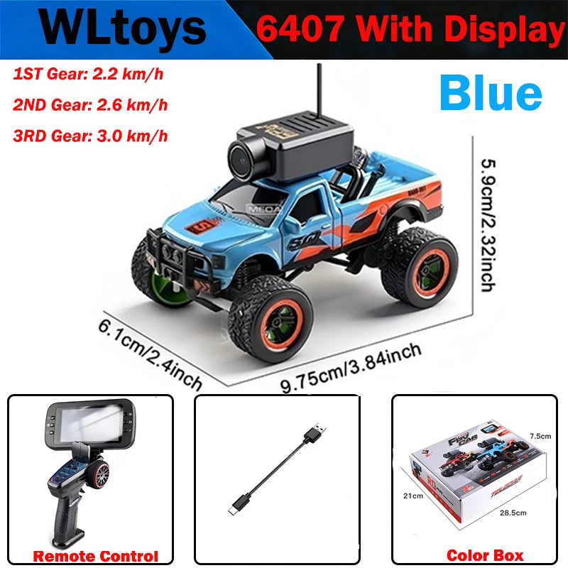 Blue WLtoys 6407 RC monster truck with display, remote control, and color box.