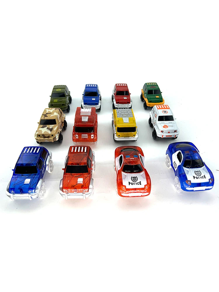 A collection of various colored race track cars, including green, blue, red, and yellow models.
