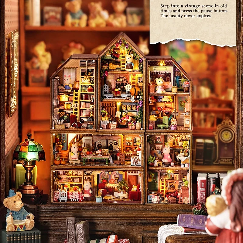 A detailed wooden miniature dollhouse kit featuring various figures and scenes assembled in a puzzle format.
