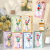 A set of flower bouquet building blocks with vases for DIY home decor, featuring roses and sunflowers.