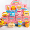 A box of 12 squishy dessert toys featuring cute animal and food characters in various colors.