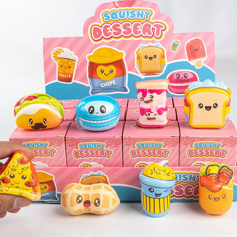 A box of 12 squishy dessert toys featuring cute animal and food characters in various colors.