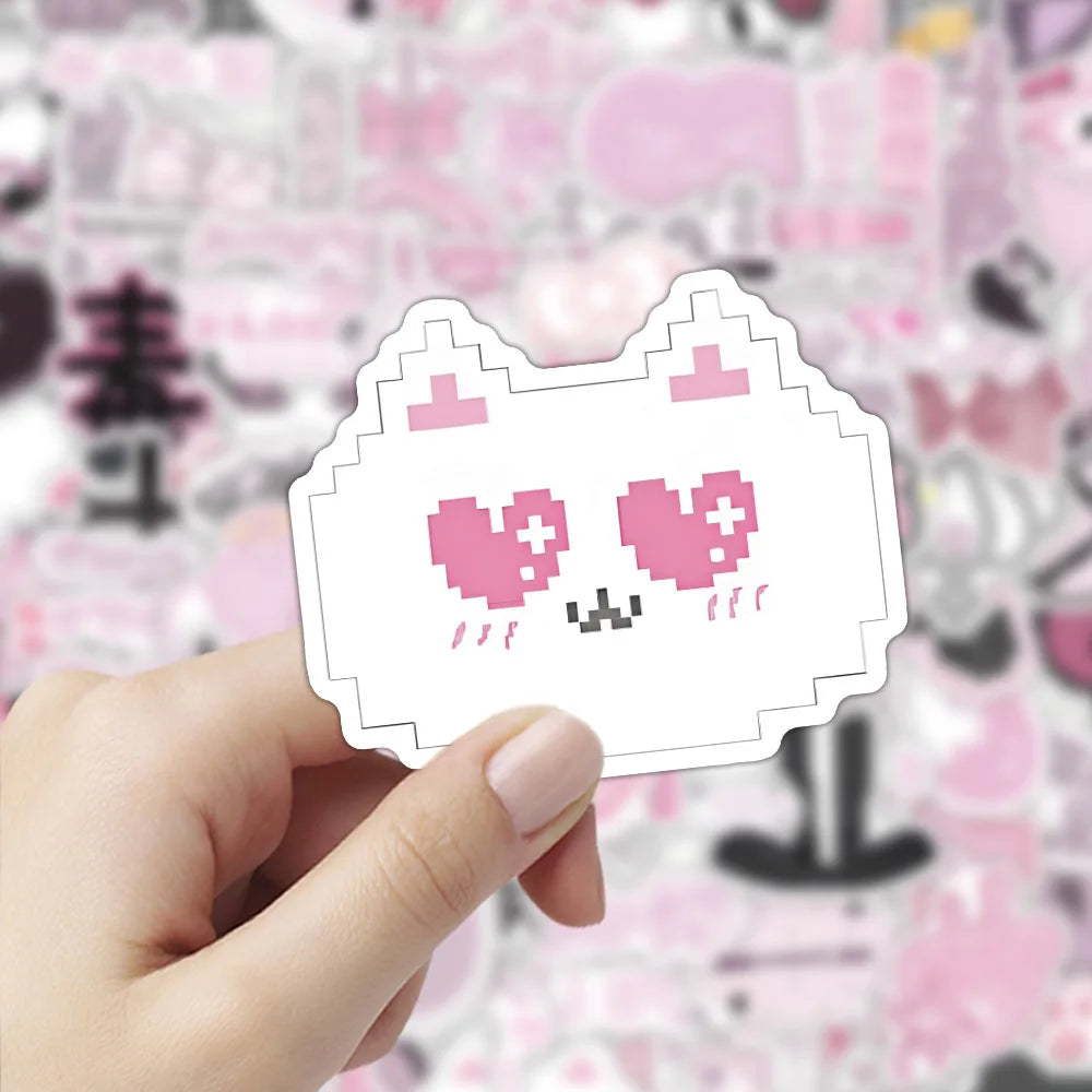 A hand holds a pink and white outline sticker featuring a cute, smiling fox face with pink hearts.