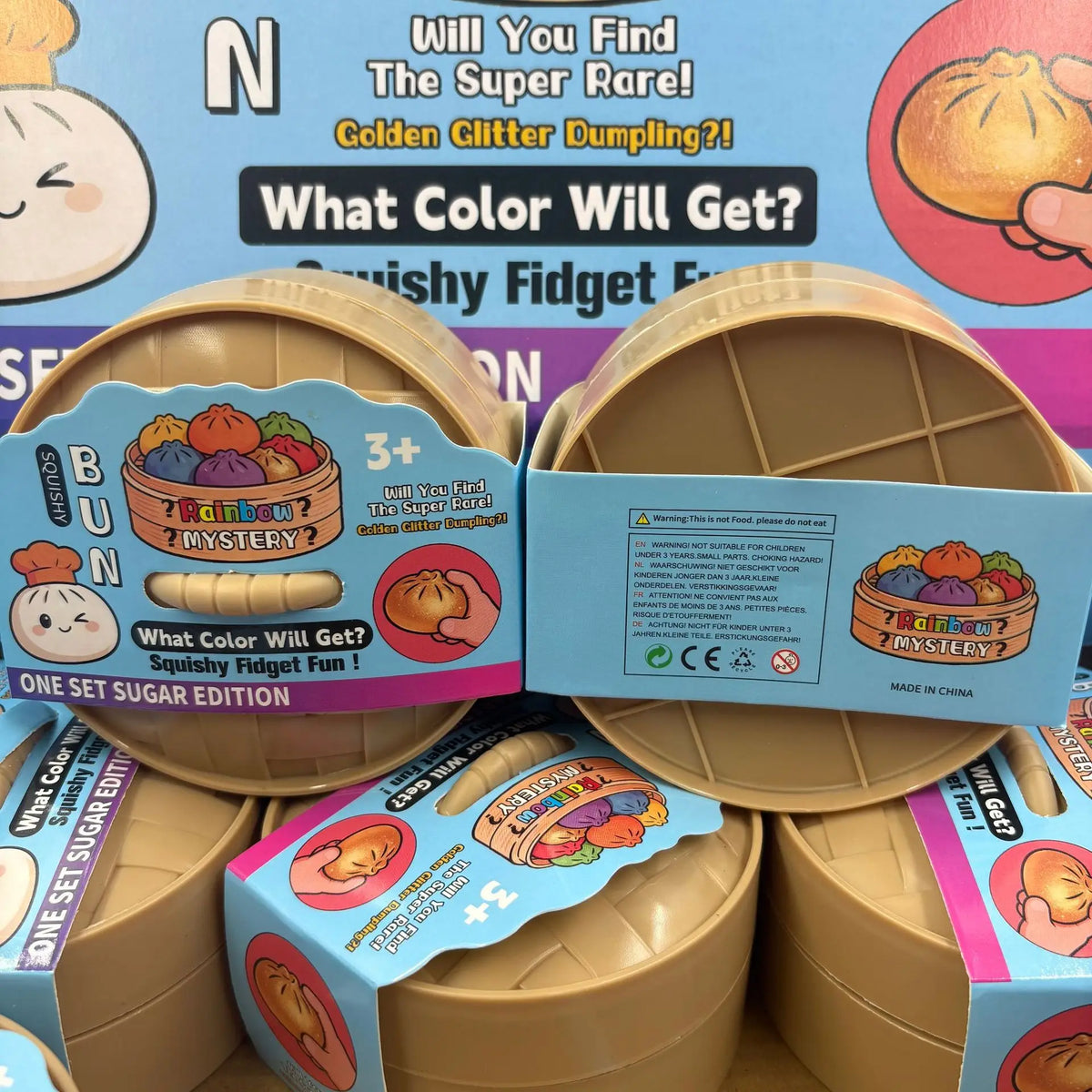A box of soft sensory squishy dumpling toys with various colored squishies and a question about finding the super rare golden