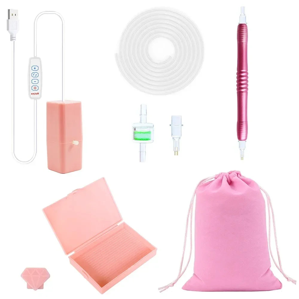 A pink electric diamond painting pen kit with a USB suction tool and various accessories.