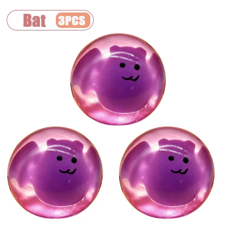 Three purple pumpkin head squishy stress relief toys