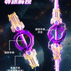 A close-up view of a purple and gold lightsaber with glowing effects, showing its blade, hilt, and various components.