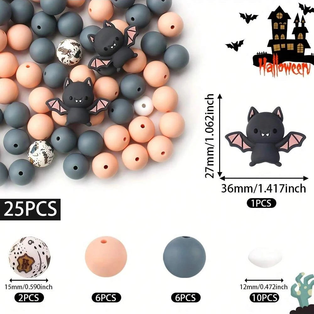 A set of 25 silicone beads in various colors and shapes including cats, bats, and round spheres for jewelry and crafting.