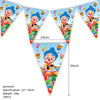 A triangular banner decoration featuring a clown character for a kids' birthday party.