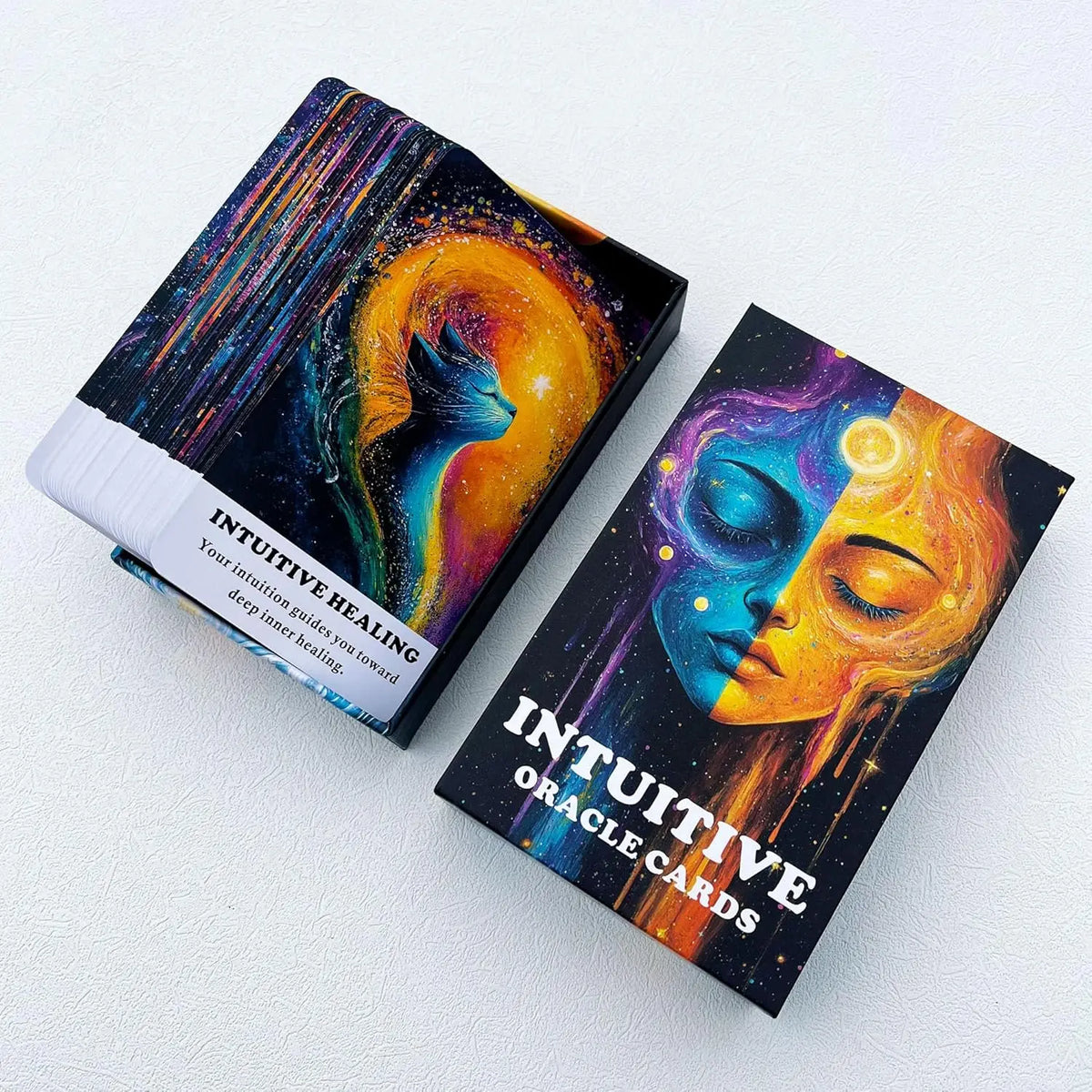 A deck of intuitive oracle cards featuring vibrant colors and mystical imagery on a dark background.