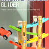 A set of wooden racing track gliders in various colors, including orange, green, yellow, and blue, for babies over 18 months 