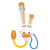 A bath toy shaped like a rabbit with carrot features an adjustable water sprinkler.