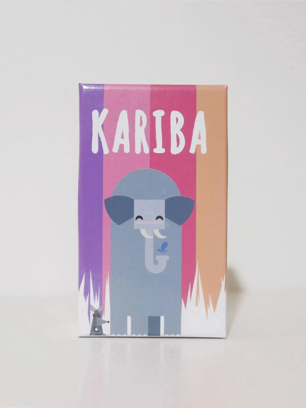 A box for the Kariba board game featuring a stylized elephant illustration against a striped background.