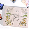 A beige journal cover featuring a line drawing of a pregnant silhouette surrounded by floral illustrations for a pregnancy jo