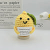 Handwoven crochet pencil ornament shaped like a lemon with green leaves, yellow color.