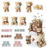 A collection of adorable bear cake toppers in various colors and sizes for birthday and baby shower celebrations.